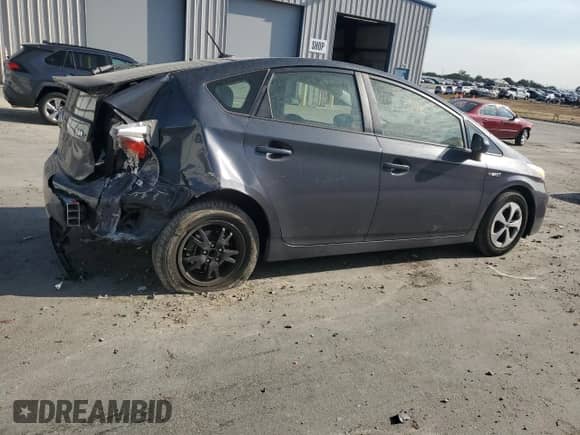 2014 Toyota Prius Four с VIN JTDKN3DU3E0370018, выставлен на аукционе Copart как лот 71320445 с пробегом 151 816 миль миль и Списание • Salvage title. История ставок и продаж доступна на DreamBid. Изображение 3.