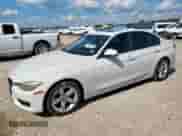 2015 BMW 3 Series 328i with VIN WBA3C1C5XFK123865, listed as a Copart auction lot 71325385 with 209,902 mi miles and Salvage title. Bid and sale history available at DreamBid. Image 1.