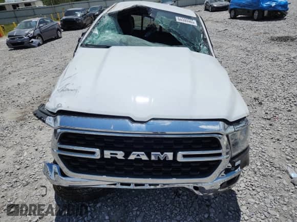 2023 Ram 1500 Big Horn with VIN 1C6SRFBT8PN557588, listed as a Copart auction lot 64599985 with 51,295 mi miles and Salvage title. Bid and sale history available at DreamBid. Image 11.