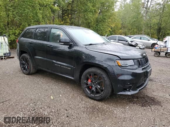 2017 Jeep Grand Cherokee SRT с VIN 1C4RJFDJ5HC723301, выставлен на аукционе Copart как лот 81391735 с пробегом 127 835 миль миль и На запчасти • Non repairable. История ставок и продаж доступна на DreamBid. Изображение 4.