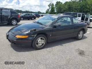 1996 Saturn 2dr Coupe with VIN 1G8ZH1279TZ371071, listed as a Copart auction lot 66602245 with 107,563 mi miles and Salvage title. Bid and sale history available at DreamBid. Image 1.
