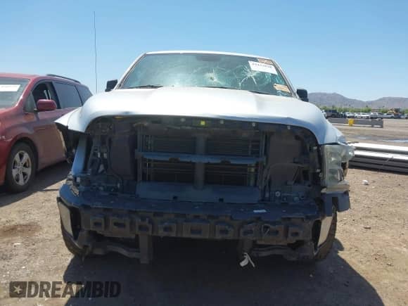 2019 Ram 1500 Tradesman z VIN 1C6RR6FG4KS586124, wystawiony jako IAAI lot #42432848 z przebiegiem 103 162 mil mil oraz . Historia ofert i sprzedaży dostępna na DreamBid. Obrazek 12.