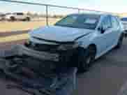 2021 Toyota Camry Hybrid LE with VIN 4T1C31AK3MU560440, listed as a IAAI auction lot 43202632 with 65,038 mi miles and . Bid and sale history available at DreamBid. Image 2.