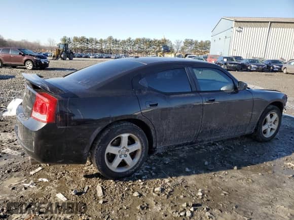 2010 Dodge Charger 3.5L with VIN 2B3CK2CV5AH318074, listed as a Copart auction lot 86012634 with 122,498 mi miles and Salvage title. Bid and sale history available at DreamBid. Image 3.