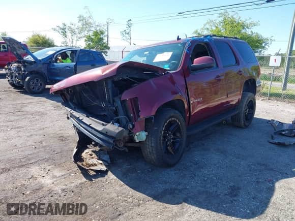 2009 Chevrolet Tahoe 2LT z VIN 1GNFK23059R125278, wystawiony jako IAAI lot #42059416 z przebiegiem 174 502 mil mil oraz . Historia ofert i sprzedaży dostępna na DreamBid. Obrazek 2.