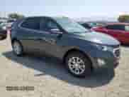 2020 Chevrolet Equinox LT с VIN 3GNAXTEV8LS551366, выставлен на аукционе Copart как лот 62560365 с пробегом 78 875 миль миль и Списание • Salvage title. История ставок и продаж доступна на DreamBid. Изображение 4.
