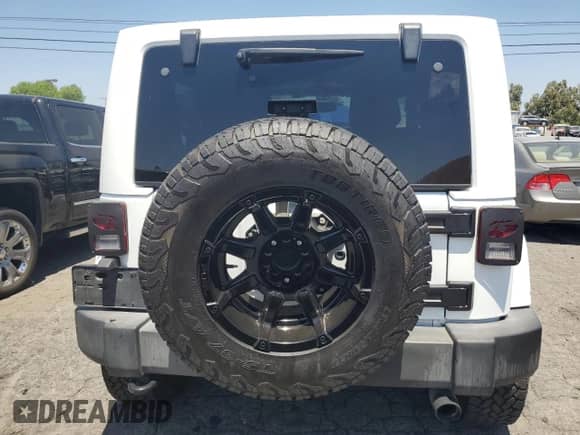 2015 Jeep Wrangler Rubicon Hard Rock z VIN 1C4BJWCG5FL561397, wystawiony jako Copart lot #61218185 z przebiegiem 164 240 mil mil oraz Czysty tytuł • Clean title. Historia ofert i sprzedaży dostępna na DreamBid. Obrazek 6.