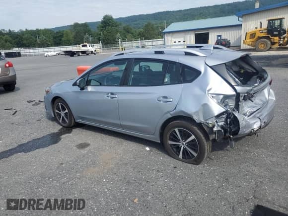 2023 Subaru Impreza Premium with VIN 4S3GTAD67P3710922, listed as a Copart auction lot 66517285 with 56,621 mi miles and Salvage title. Bid and sale history available at DreamBid. Image 2.