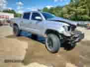 2020 Toyota Tacoma SR5 z VIN 3TMCZ5AN1LM311240, wystawiony jako Copart lot #85188965 z przebiegiem 149 027 mil mil oraz Szkoda całkowita • Salvage title. Historia ofert i sprzedaży dostępna na DreamBid. Obrazek 4.