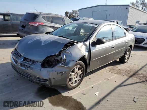 2005 Dodge Neon SXT z VIN 1B3ES56C45D133814, wystawiony jako Copart lot #83533794 z przebiegiem 179 574 mil mil oraz Szkoda całkowita • Salvage title. Historia ofert i sprzedaży dostępna na DreamBid. Obrazek 1.
