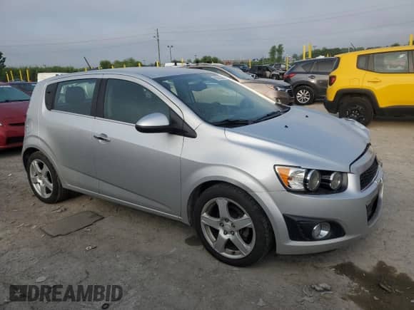2015 Chevrolet Sonic LTZ with VIN 1G1JE6SB4F4208996, listed as a Copart auction lot 65555385 with 76,714 mi miles and Salvage title. Bid and sale history available at DreamBid. Image 4.