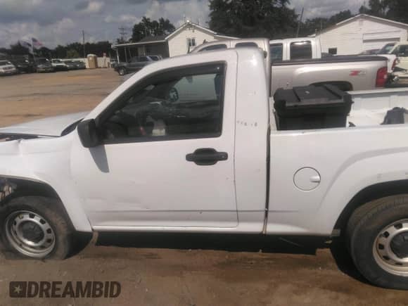 2012 Chevrolet Colorado Work Truck z VIN 1GCCSBF92C8137987, wystawiony jako IAAI lot #43297310 z przebiegiem 202 487 mil mil oraz . Historia ofert i sprzedaży dostępna na DreamBid. Obrazek 14.