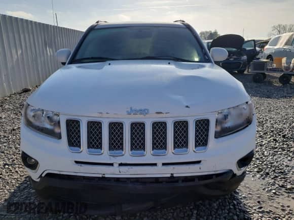 2017 Jeep Compass Latitude with VIN 1C4NJCEA9HD130529, listed as a Copart auction lot 52049285 with 82,338 mi miles and Salvage title. Bid and sale history available at DreamBid. Image 5.