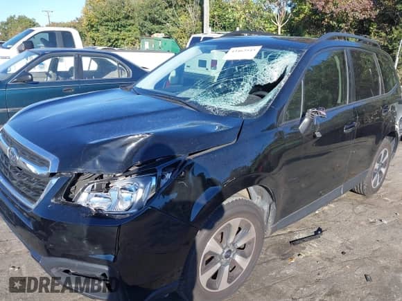 2018 Subaru Forester Premium z VIN JF2SJAEC5JH405628, wystawiony jako IAAI lot #43463543 z przebiegiem 106 481 mil mil oraz . Historia ofert i sprzedaży dostępna na DreamBid. Obrazek 6.