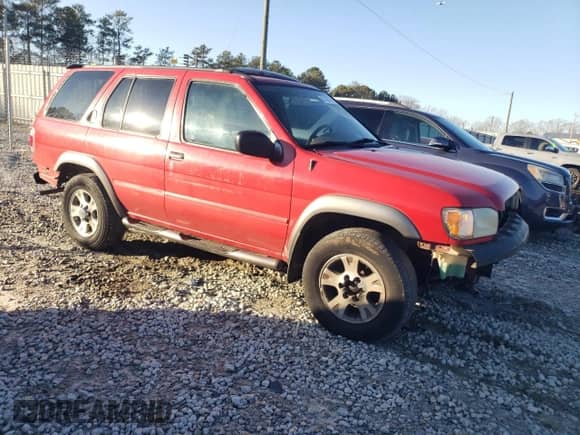 2000 Nissan Pathfinder XE with VIN JN8AR07S9YW434755, listed as a Copart auction lot 87693185 with 289,933 mi miles and Salvage title. Bid and sale history available at DreamBid. Image 4.