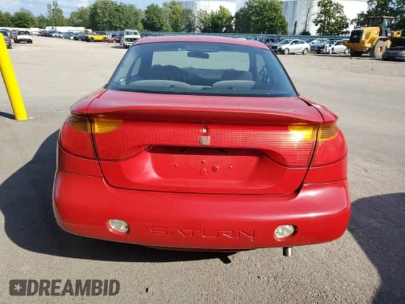 2001 Saturn SC z VIN 1G8ZY127X1Z116460, wystawiony jako Copart lot #67962944 z przebiegiem 93 372 mil mil oraz Nie do naprawy • Non repairable. Historia ofert i sprzedaży dostępna na DreamBid. Obrazek 6.