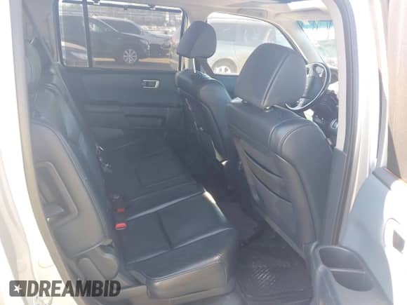 2009 Honda Pilot Touring with VIN 5FNYF488X9B023366, listed as a IAAI auction lot 43068300 with 210,590 mi miles and . Bid and sale history available at DreamBid. Image 8.