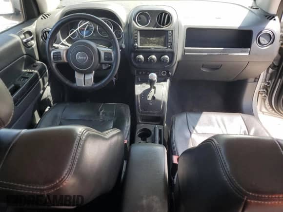 2012 Jeep Compass Limited с VIN 1C4NJCCB8CD560007, выставлен на аукционе Copart как лот 60725985 с пробегом 120 757 миль миль и Списание • Salvage title. История ставок и продаж доступна на DreamBid. Изображение 8.