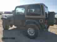 1999 Jeep Wrangler Sahara with VIN 1J4FY49S9XP479545, listed as a Copart auction lot 54753745 with 34,642 mi miles and Salvage title. Bid and sale history available at DreamBid. Image 2.