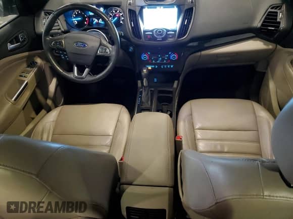 2017 Ford Escape Titanium with VIN 1FMCU9J92HUA64401, listed as a Copart auction lot 65155895 with 184,708 mi miles and Salvage title. Bid and sale history available at DreamBid. Image 8.