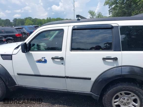 2011 Dodge Nitro SE with VIN 1D4PT2GK6BW590135, listed as a IAAI auction lot 42885591 with 192,411 mi miles and . Bid and sale history available at DreamBid. Image 14.