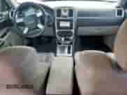 2006 Chrysler 300 C with VIN 2C3KA63H06H423471, listed as a Copart auction lot 80374895 with 180,078 mi miles and Salvage title. Bid and sale history available at DreamBid. Image 8.