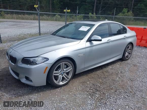 2014 BMW 5 Series 535d with VIN WBAXA5C52ED690864, listed as a IAAI auction lot 43275117 with 223,855 mi miles and . Bid and sale history available at DreamBid. Image 2.