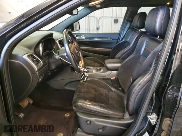 2017 Jeep Grand Cherokee Trailhawk z VIN 1C4RJFLG8HC630777, wystawiony jako Copart lot #81770235 z przebiegiem 78 773 mil mil oraz Szkoda całkowita • Salvage title. Historia ofert i sprzedaży dostępna na DreamBid. Obrazek 7.