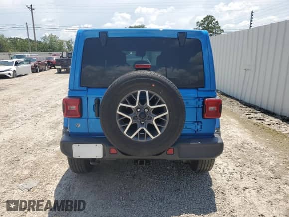 2024 Jeep Wrangler Sahara с VIN 1C4PJXEN9RW113061, выставлен на аукционе Copart как лот 66618365 с пробегом 18 911 миль миль и Списание • Salvage title. История ставок и продаж доступна на DreamBid. Изображение 6.