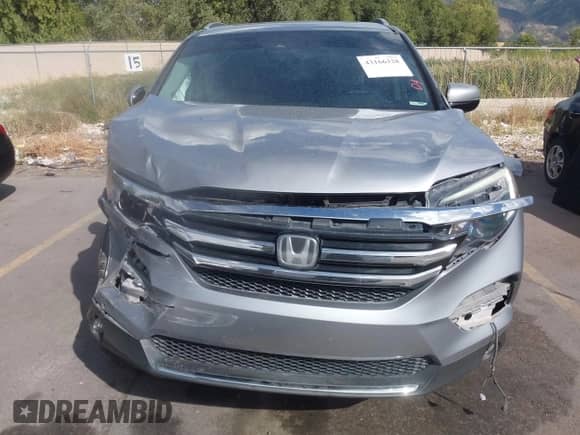 2016 Honda Pilot Touring z VIN 5FNYF6H94GB012204, wystawiony jako IAAI lot #43166328 z przebiegiem 108 897 mil mil oraz . Historia ofert i sprzedaży dostępna na DreamBid. Obrazek 12.