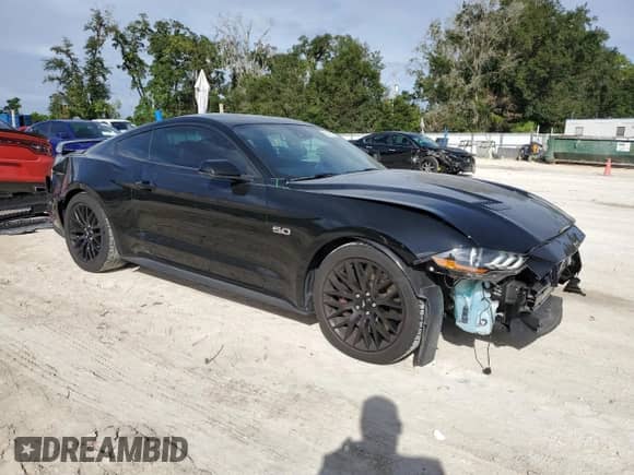 2020 Ford Mustang GT с VIN 1FA6P8CF0L5114842, выставлен на аукционе Copart как лот 85311535 с пробегом 47 562 миль миль и Списание • Salvage title. История ставок и продаж доступна на DreamBid. Изображение 4.