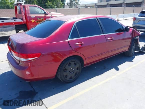 2004 Honda Accord LX with VIN 1HGCM66314A067133, listed as a IAAI auction lot 42877430 with 166,788 mi miles and . Bid and sale history available at DreamBid. Image 4.