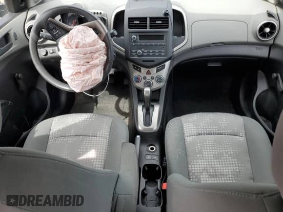 2016 Chevrolet Sonic LS с VIN 1G1JA5SH1G4121696, выставлен на аукционе Copart как лот 80178975 с пробегом Не указан миль и Списание • Salvage title. История ставок и продаж доступна на DreamBid. Изображение 8.