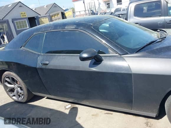 2015 Dodge Challenger SXT z VIN 2C3CDZAG5FH770530, wystawiony jako IAAI lot #41971010 z przebiegiem 144 803 mil mil oraz . Historia ofert i sprzedaży dostępna na DreamBid. Obrazek 13.