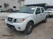 2017 Nissan Frontier SV with VIN 1N6AD0EV8HN726360, listed as a IAAI auction lot 42299072 with 149,645 mi miles and . Bid and sale history available at DreamBid. Image 2.