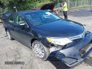 2014 Toyota Camry LE с VIN 4T1BD1FK8EU106591, выставлен на аукционе IAAI как лот 42989238 с пробегом 231 165 миль миль и . История ставок и продаж доступна на DreamBid. Изображение 1.