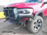 2022 Ram 1500 Rebel z VIN 1C6SRFLT9NN307014, wystawiony jako IAAI lot #41680604 z przebiegiem 45 214 mil mil oraz . Historia ofert i sprzedaży dostępna na DreamBid. Obrazek 19.