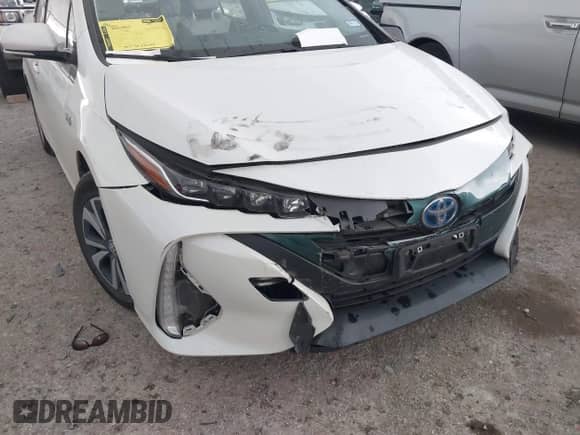 2018 Toyota Prius Plus z VIN JTDKARFP0J3084142, wystawiony jako IAAI lot #41936736 z przebiegiem 50 699 mil mil oraz . Historia ofert i sprzedaży dostępna na DreamBid. Obrazek 17.