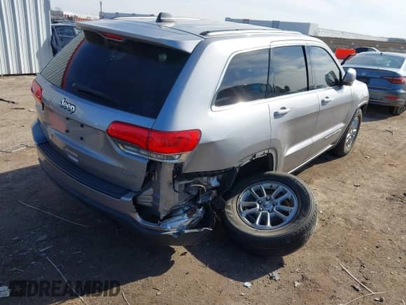 2018 Jeep Grand Cherokee Altitude z VIN 1C4RJEAGXJC429126, wystawiony jako IAAI lot #41300948 z przebiegiem 61 683 mil mil oraz . Historia ofert i sprzedaży dostępna na DreamBid. Obrazek 4.