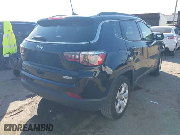 2020 Jeep Compass Latitude with VIN 3C4NJCBB7LT133977, listed as a IAAI auction lot 40950290 with 71,428 mi miles and . Bid and sale history available at DreamBid. Image 4.