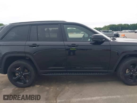 2023 Jeep Grand Cherokee Altitude with VIN 1C4RJGAG8PC648073, listed as a IAAI auction lot 42338453 with 30,505 mi miles and . Bid and sale history available at DreamBid. Image 13.