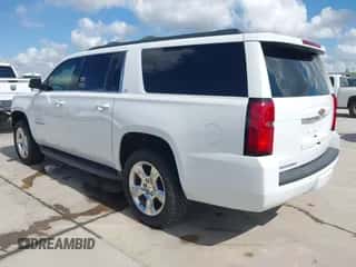 2016 Chevrolet Suburban LT z VIN 1GNSCHKC6GR143361, wystawiony jako IAAI lot #43343507 z przebiegiem 147 446 mil mil oraz . Historia ofert i sprzedaży dostępna na DreamBid. Obrazek 3.