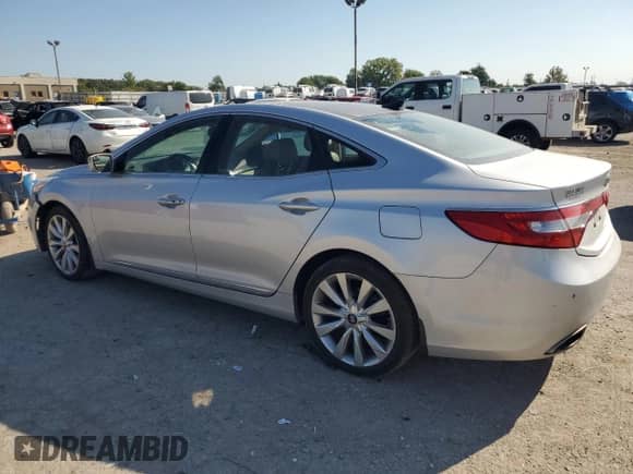2014 Hyundai Azera Limited с VIN KMHFH4JG1EA340888, выставлен на аукционе Copart как лот 69522234 с пробегом Не указан миль и Списание • Salvage title. История ставок и продаж доступна на DreamBid. Изображение 2.