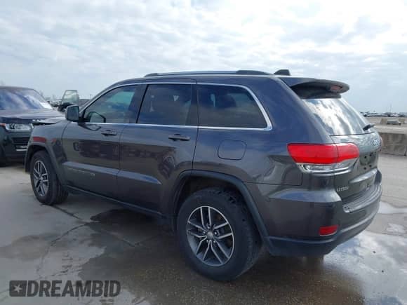 2018 Jeep Grand Cherokee Laredo z VIN 1C4RJEAG7JC450922, wystawiony jako IAAI lot #41169294 z przebiegiem 158 689 mil mil oraz . Historia ofert i sprzedaży dostępna na DreamBid. Obrazek 3.
