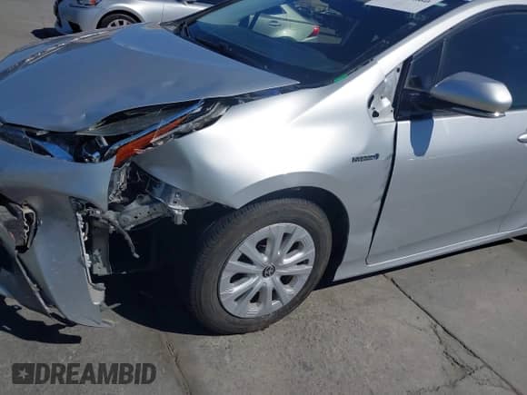 2020 Toyota Prius L Eco with VIN JTDKARFU2L3118901, listed as a IAAI auction lot 43373660 with 147,420 mi miles and . Bid and sale history available at DreamBid. Image 6.