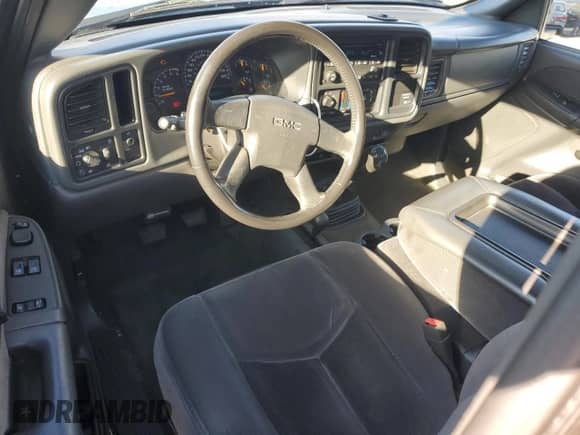 2003 GMC Sierra 1500 SLE z VIN 1GTEK14V23Z254997, wystawiony jako Copart lot #80293904 z przebiegiem 242 384 mil mil oraz Szkoda całkowita • Salvage title. Historia ofert i sprzedaży dostępna na DreamBid. Obrazek 8.