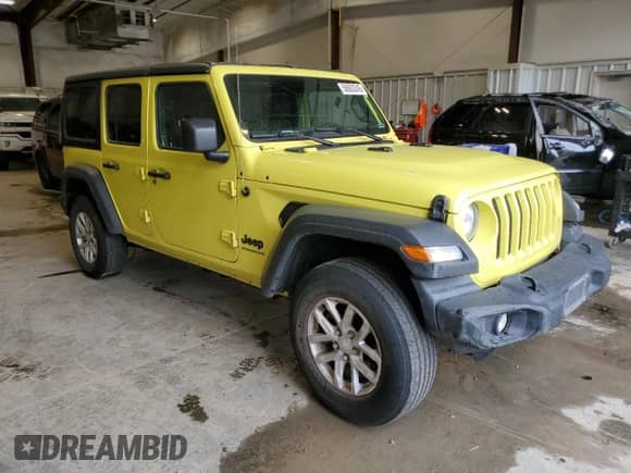 2023 Jeep Wrangler Willys with VIN 1C4HJXDG0PW653712, listed as a Copart auction lot 58603245 with 66,598 mi miles and Salvage title. Bid and sale history available at DreamBid. Image 4.
