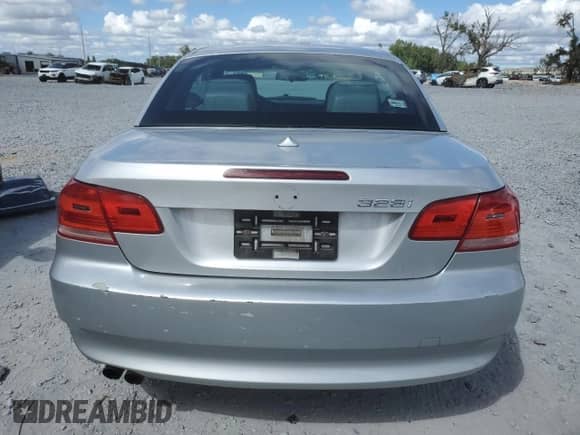 2009 BMW 3 Series 328i with VIN WBAWR33599P460929, listed as a Copart auction lot 84867615 with 123,688 mi miles and Salvage title. Bid and sale history available at DreamBid. Image 6.