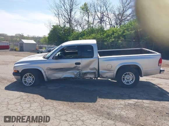 2001 Dodge Dakota with VIN 1B7GG22XX1S348751, listed as a IAAI auction lot 42077395 with 148,034 mi miles and . Bid and sale history available at DreamBid. Image 15.
