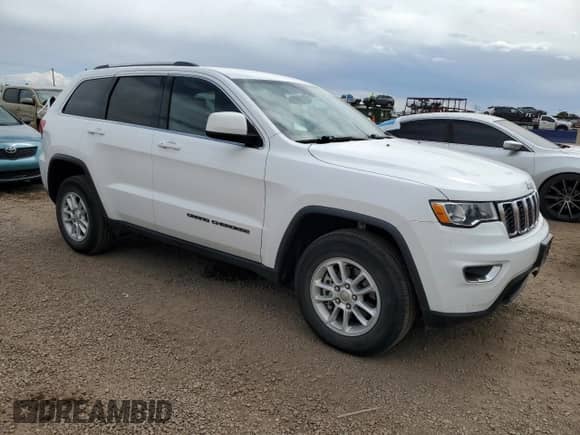 2018 Jeep Grand Cherokee Laredo E z VIN 1C4RJFAG9JC295201, wystawiony jako Copart lot #69395835 z przebiegiem 63 996 mil mil oraz Czysty tytuł • Clean title. Historia ofert i sprzedaży dostępna na DreamBid. Obrazek 4.